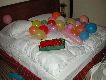 Luftballons im Bett